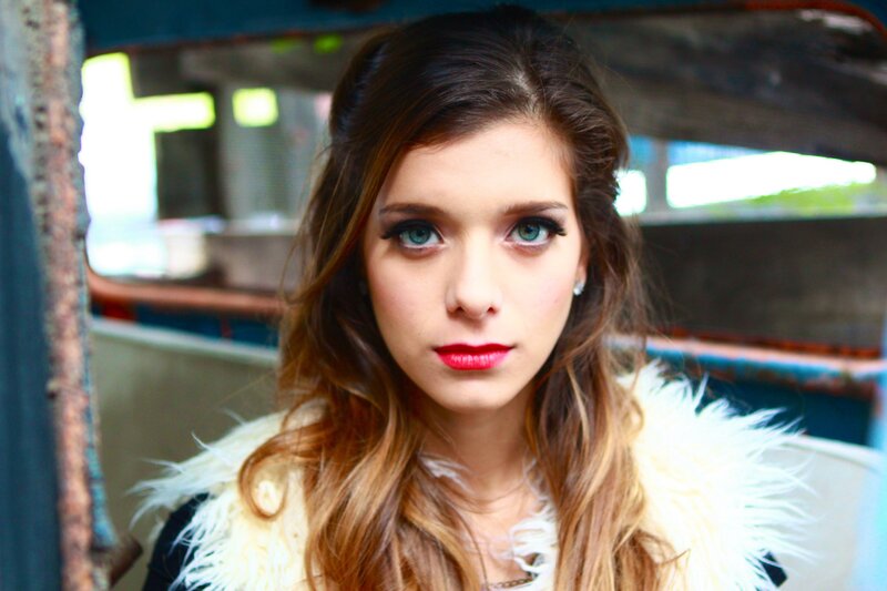 Woman with Blue Eyes — Brown, Serious, Photograph, Fur Collar