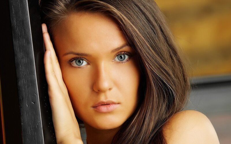 Woman with Blue Eyes — Brown, Serious, Photograph, Hand