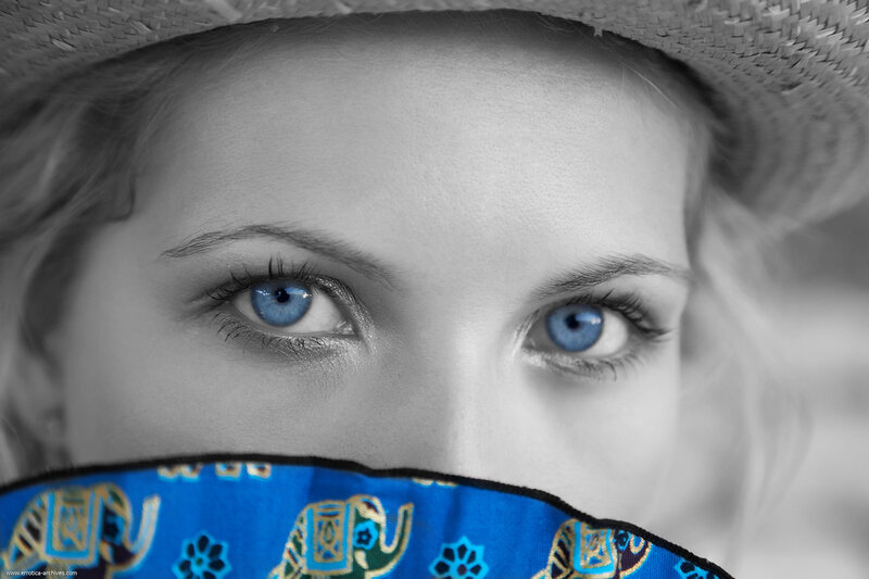 Woman with Blue Eyes — Dramatic, Photograph, Straw Hat