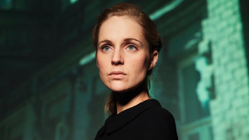 Woman with Blue Eyes — Green, Dramatic, Photograph, Black Shirt