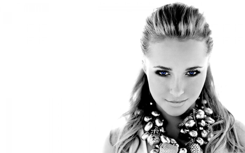 woman with blue eyes in black and white