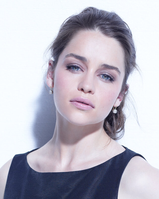 woman with blue eyes in black dress