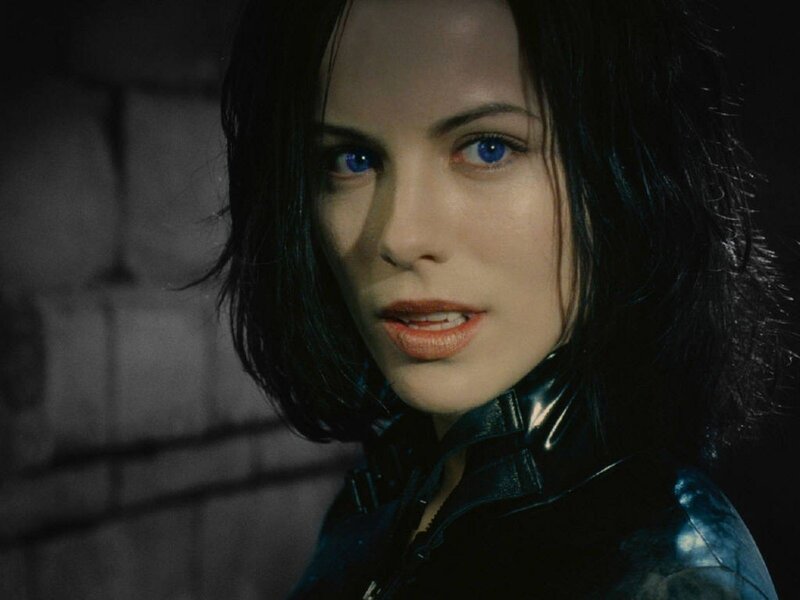 Woman with blue eyes in black jacket