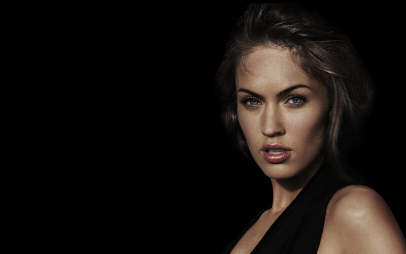 woman with blue eyes in black