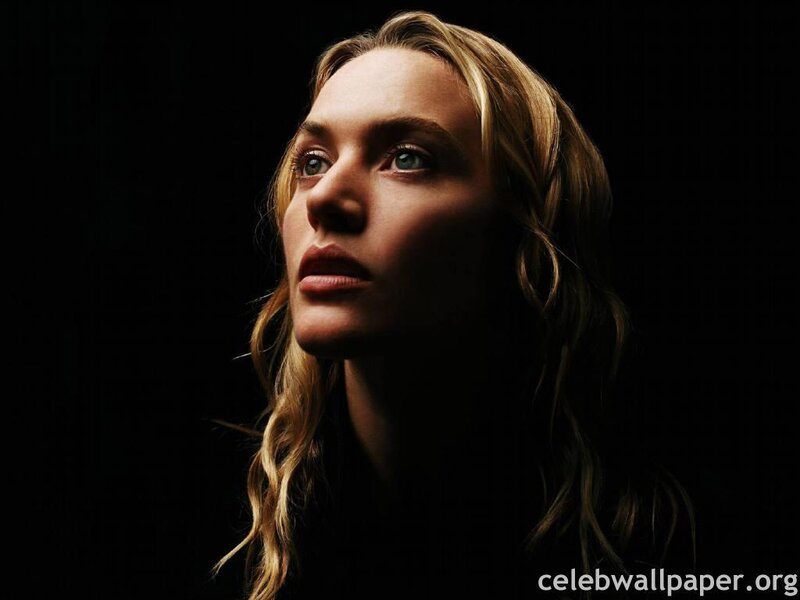 woman with blue eyes in dark setting