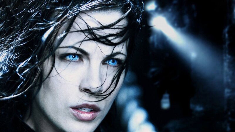 woman with blue eyes in dark setting