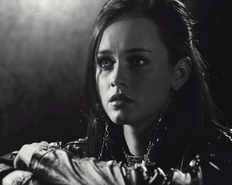 woman with blue eyes in dark setting