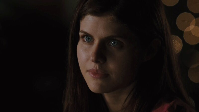 woman with blue eyes in dim light
