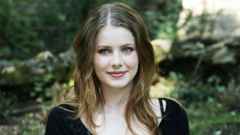 woman with blue eyes in forest