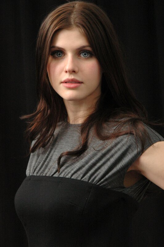 woman with blue eyes in gray dress