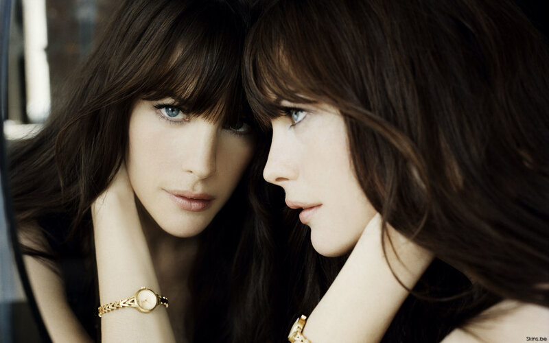 woman with blue eyes in mirror
