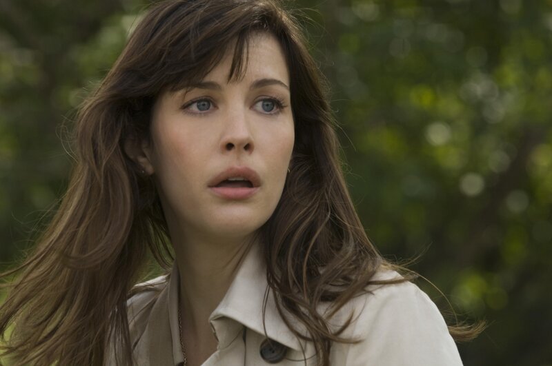 woman with blue eyes in park