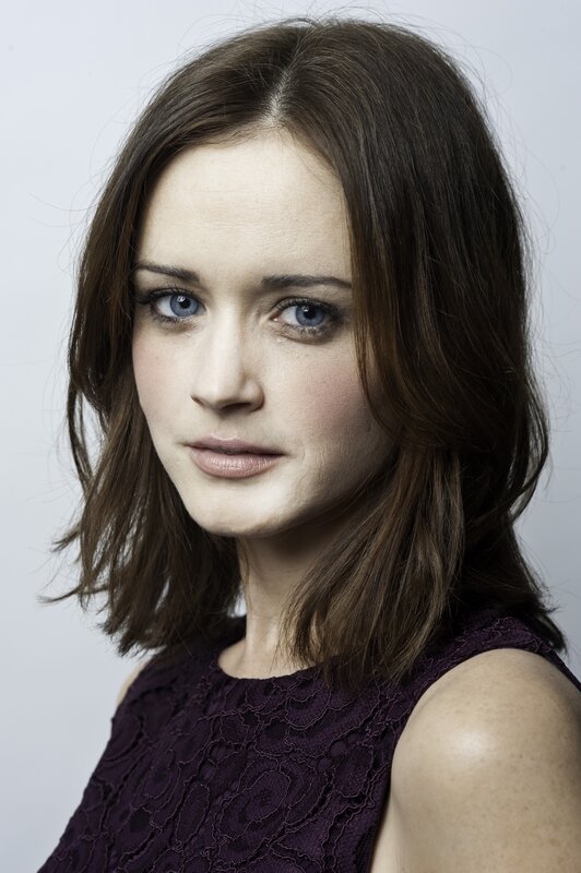 woman with blue eyes in purple dress