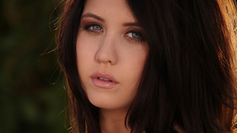 woman with blue eyes in sunlight