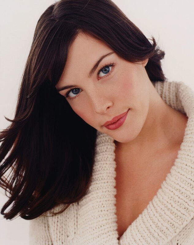 woman with blue eyes in sweater