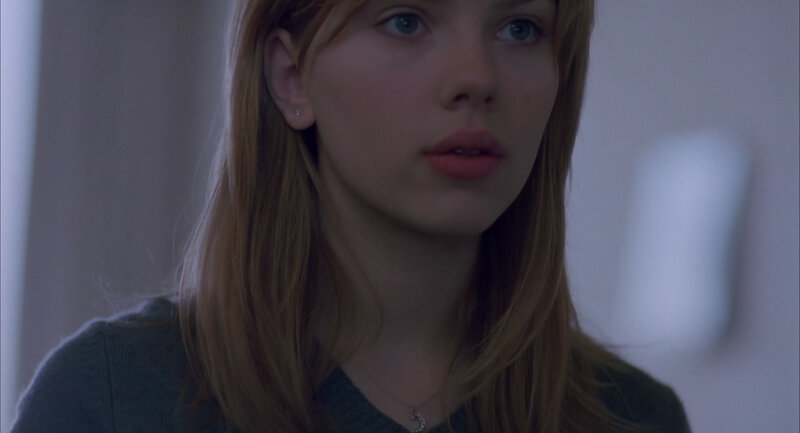 woman with blue eyes looking