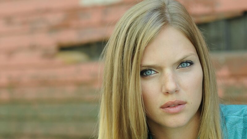 woman with blue eyes looking at camera