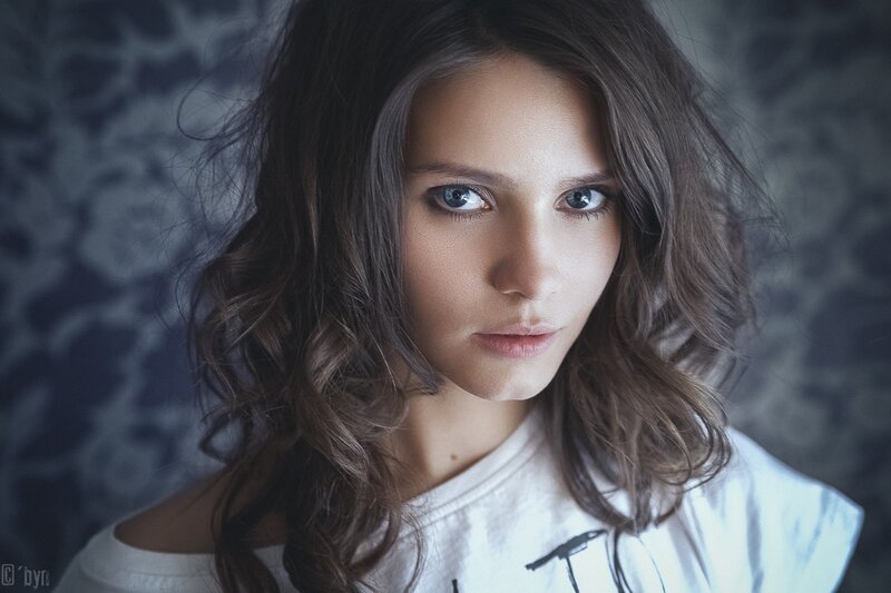 woman with blue eyes looking at camera