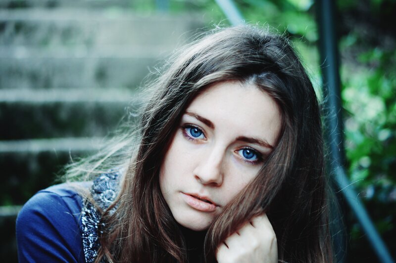 woman with blue eyes looking at camera