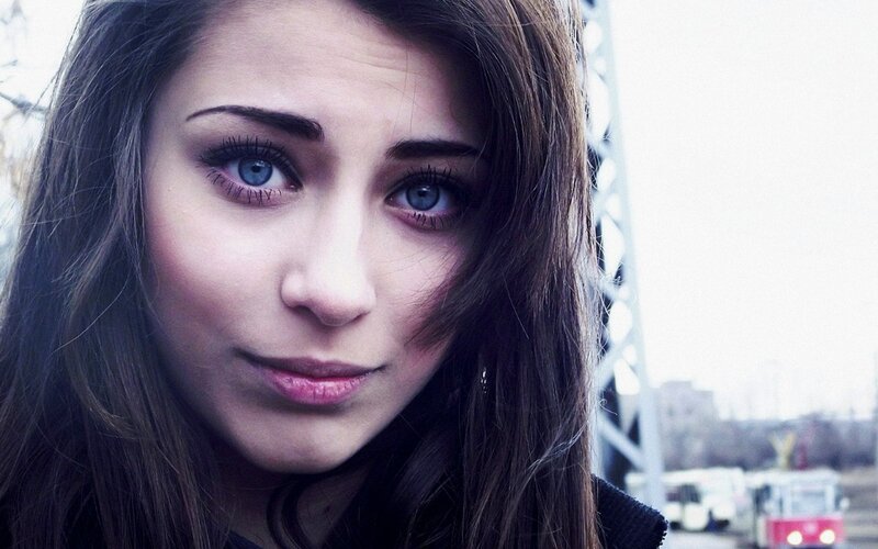 woman with blue eyes looking at camera