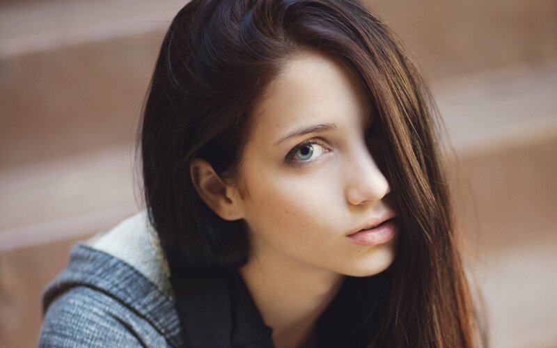 woman with blue eyes looking at camera