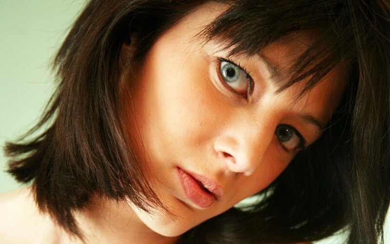 woman with blue eyes looking at camera