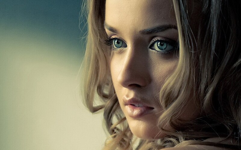 woman with blue eyes looking at camera
