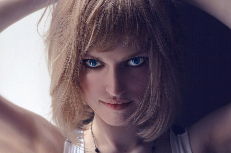 woman with blue eyes looking at camera