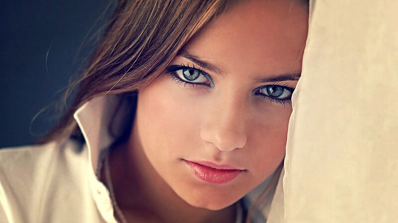 woman with blue eyes looking at camera