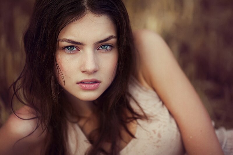woman with blue eyes looking at camera