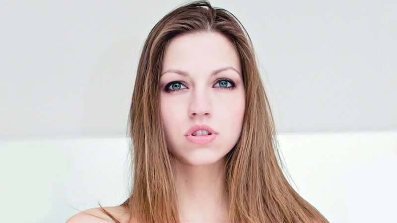 woman with blue eyes looking at camera