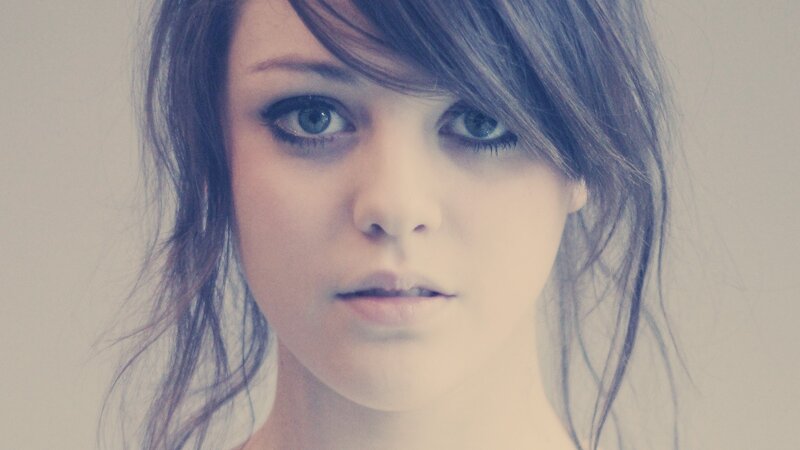 woman with blue eyes looking at camera