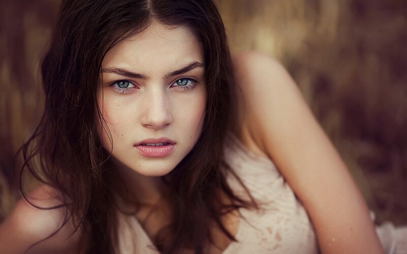 woman with blue eyes looking at camera