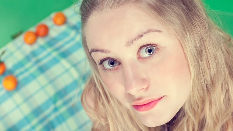 woman with blue eyes looking at camera