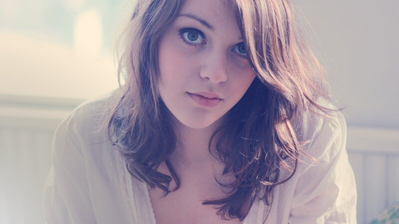 woman with blue eyes looking at camera