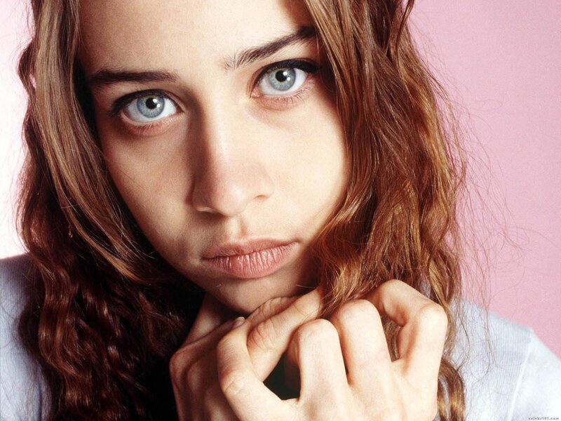 woman with blue eyes looking at camera