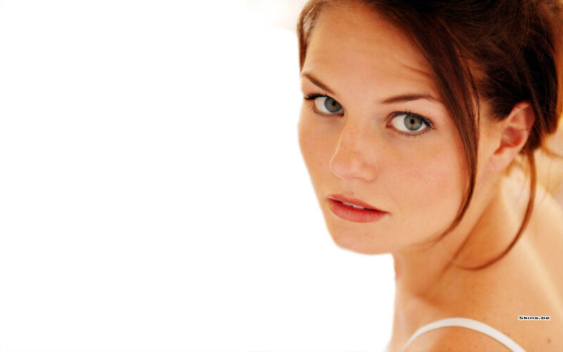 woman with blue eyes looking at camera