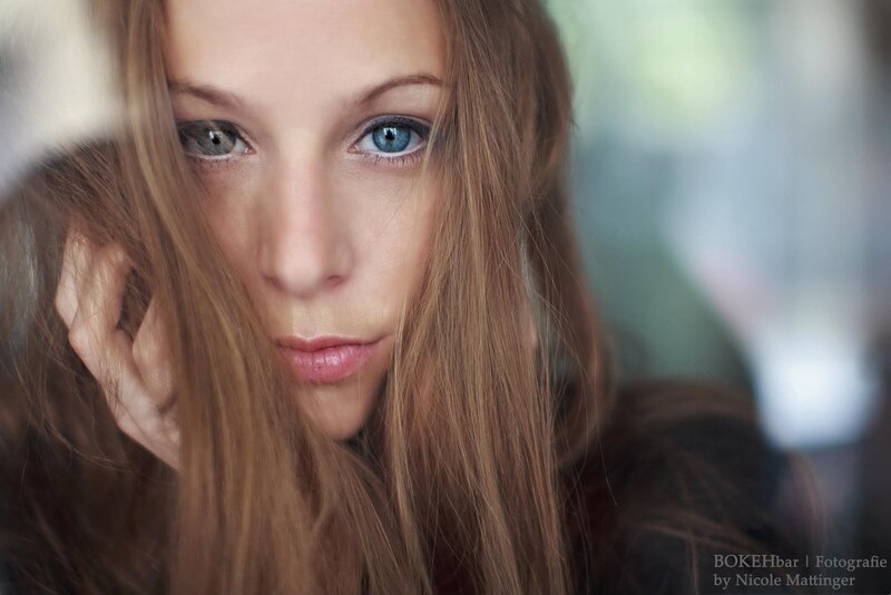 woman with blue eyes looking at camera