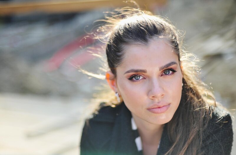 woman with blue eyes looking at camera