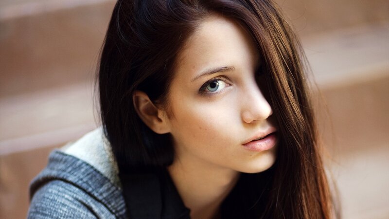 woman with blue eyes looking at camera