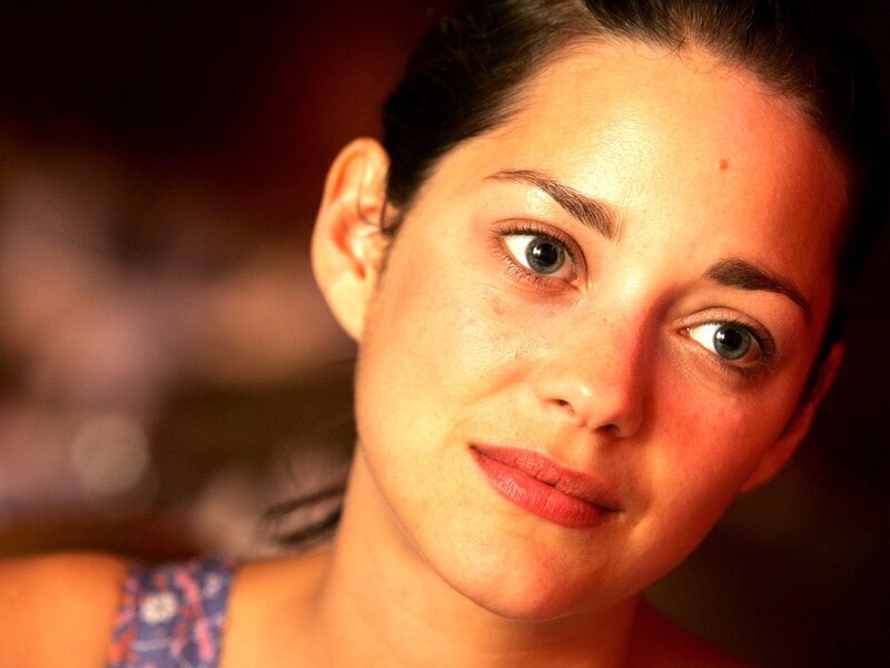 woman with blue eyes looking at camera