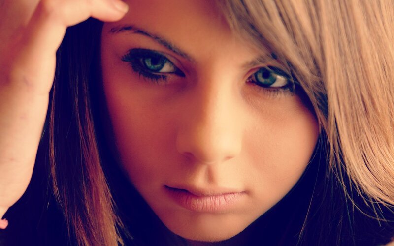 woman with blue eyes looking at camera