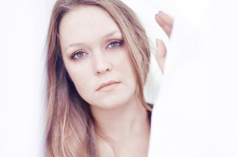 woman with blue eyes looking at camera