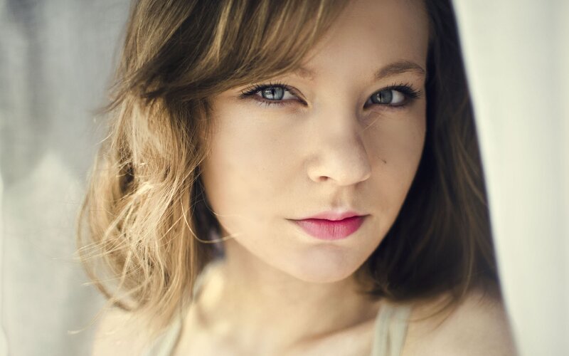 woman with blue eyes looking at camera