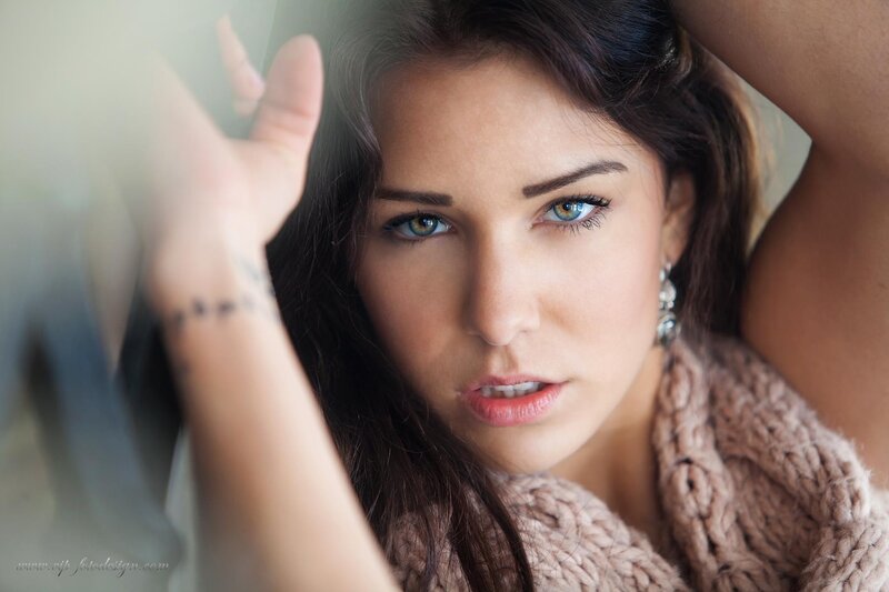 woman with blue eyes looking at camera