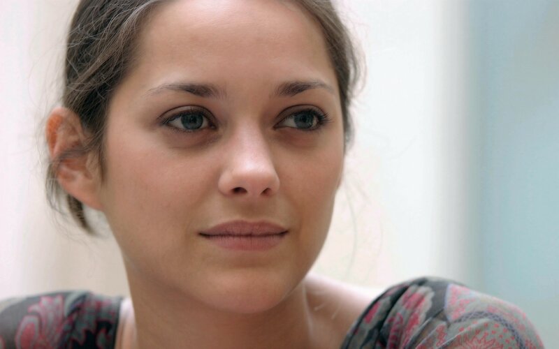 woman with blue eyes looking away