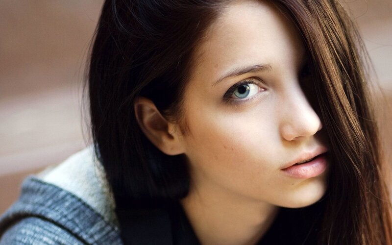 woman with blue eyes looking away