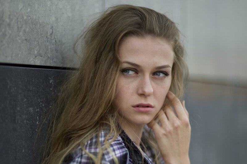 woman with blue eyes looking away