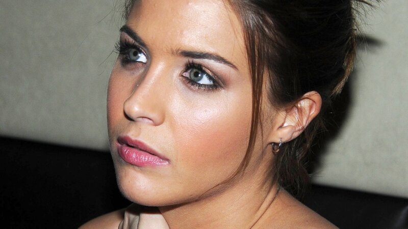 woman with blue eyes looking away