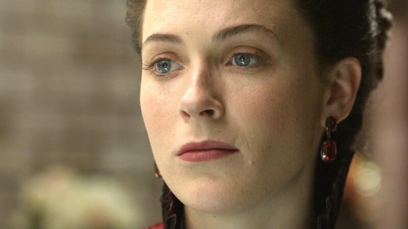woman with blue eyes looking away